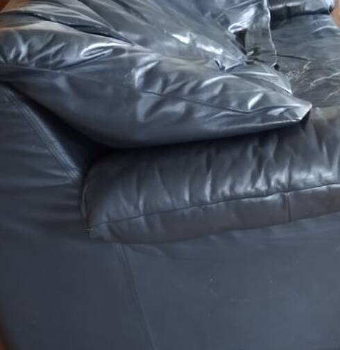 Gerard Guermonprez black leather sofa, cocooning sofa