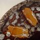 Round plate Vallauris glazed ceramic in brown and orange and Fat Lava A036