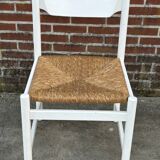 Vintage chair with wicker seat, minimalist design