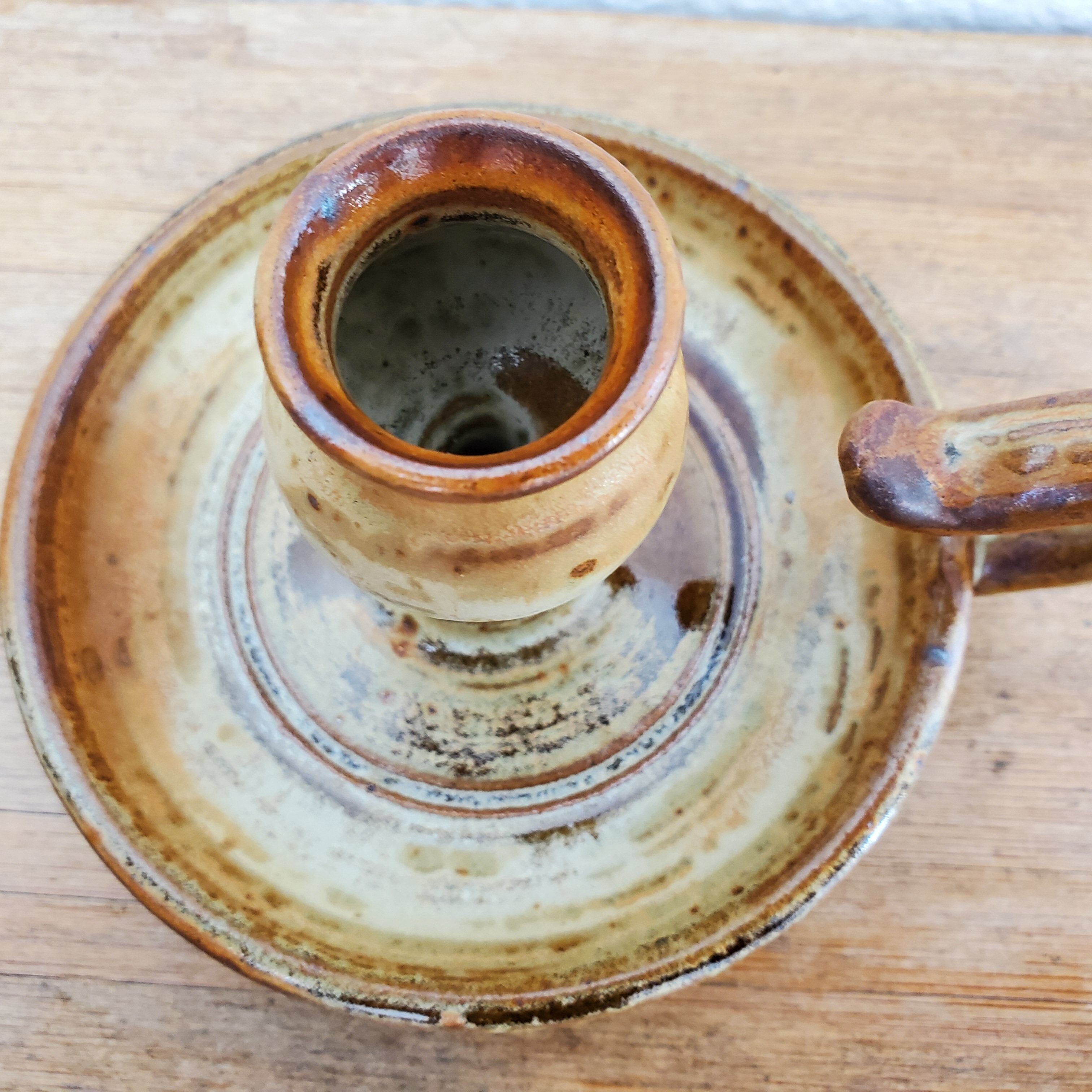 Sandstone candle holder called cellar rat