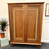 Rattan wardrobe with compass feet