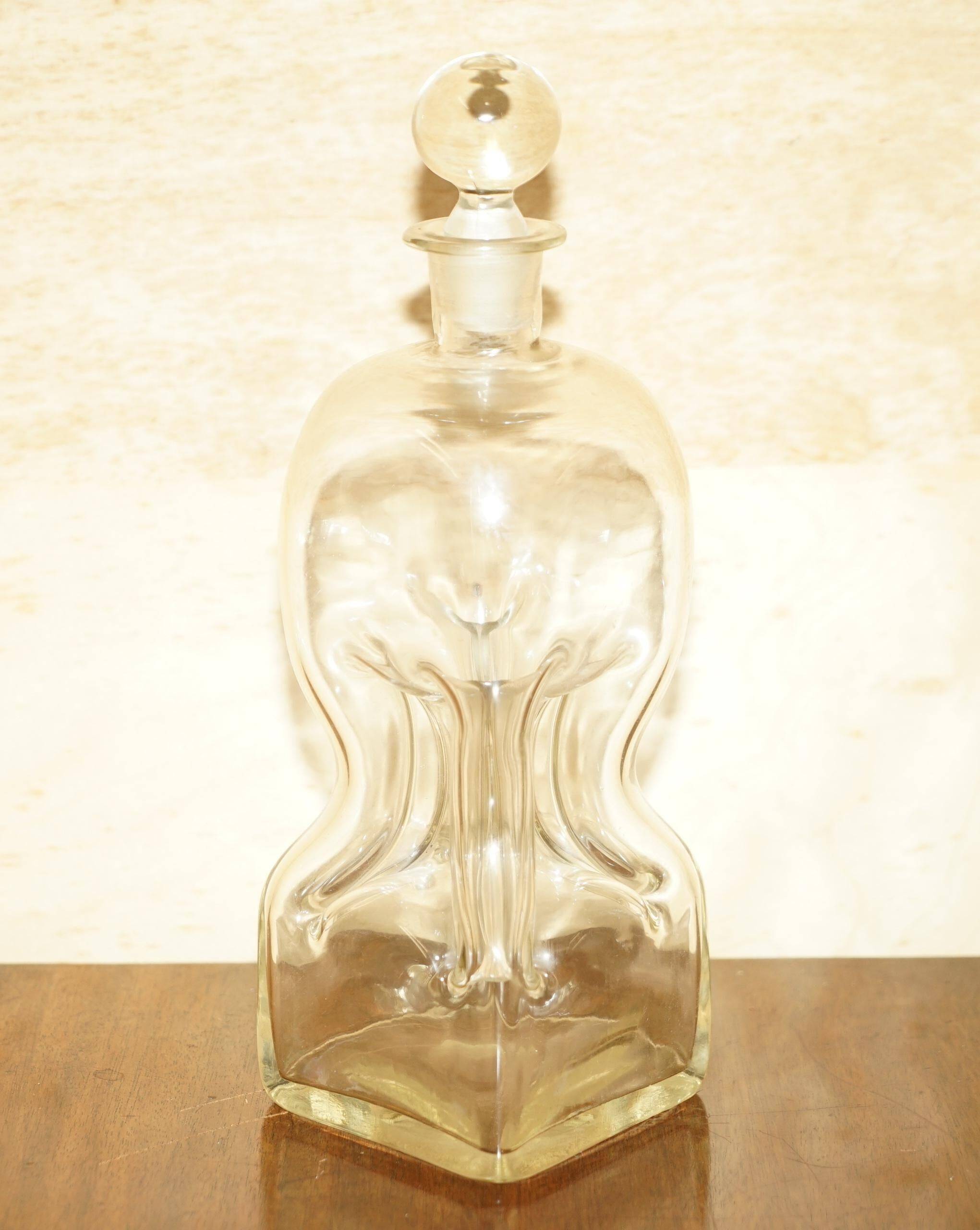 Pair of antique pinched decanters circa 1900 for serving whisky, bourbon, vodka, gin.