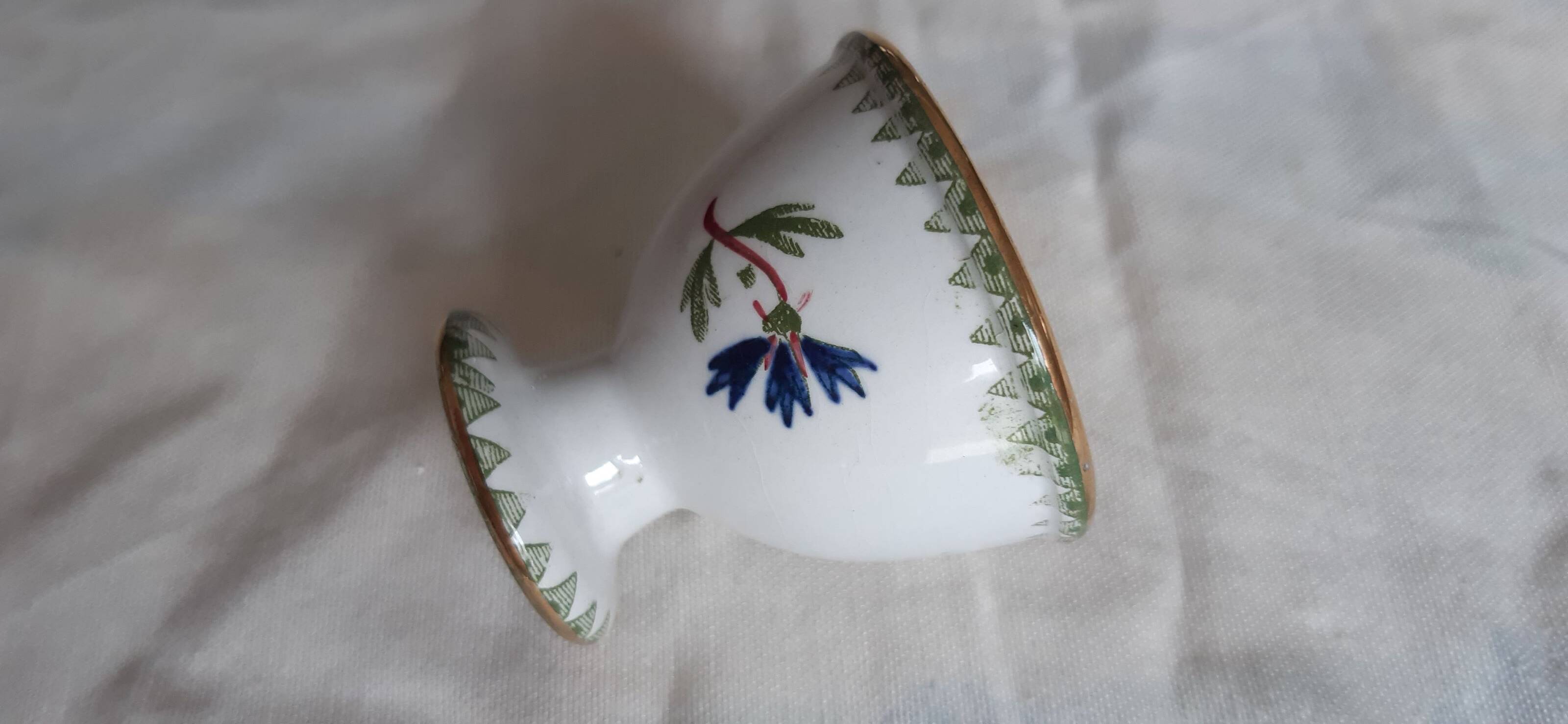 Set of three egg cups, barbel pattern decorations