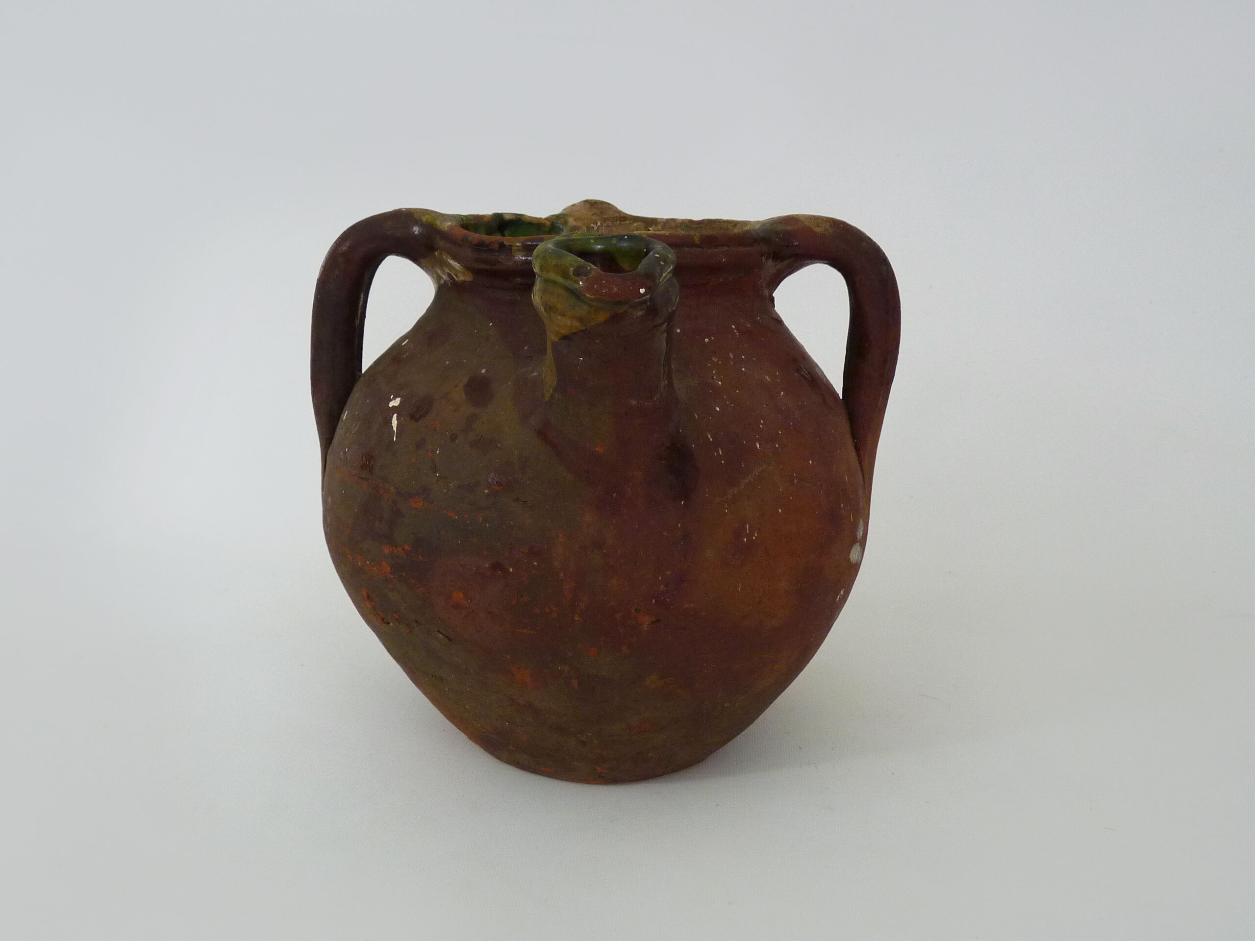 Old oil jug with 3 handles and spout. XIXth