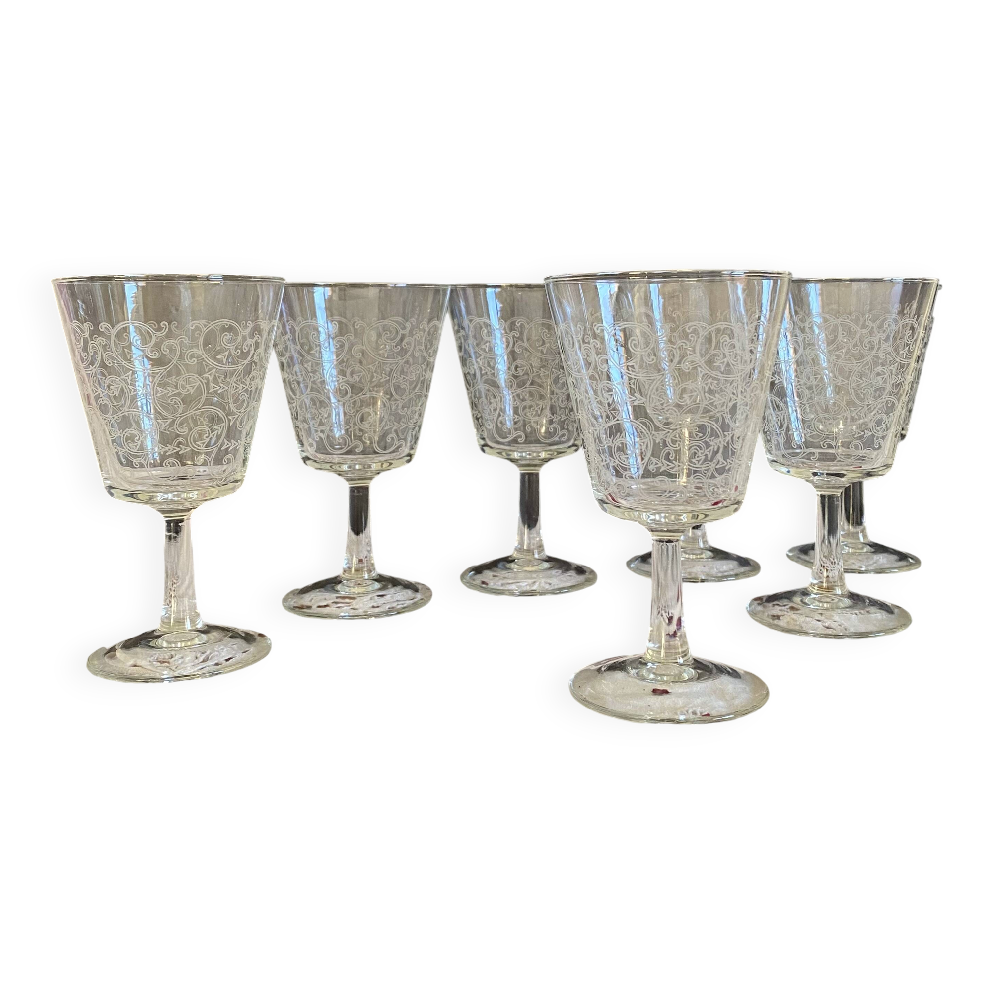 6 large antique stemmed glasses for wine or water with engraved arabesque pattern.