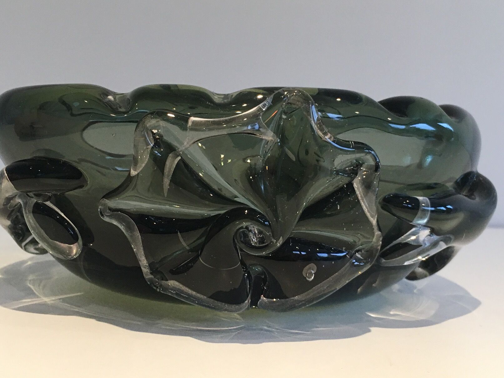 Cut glass smoked with decorations of sharks