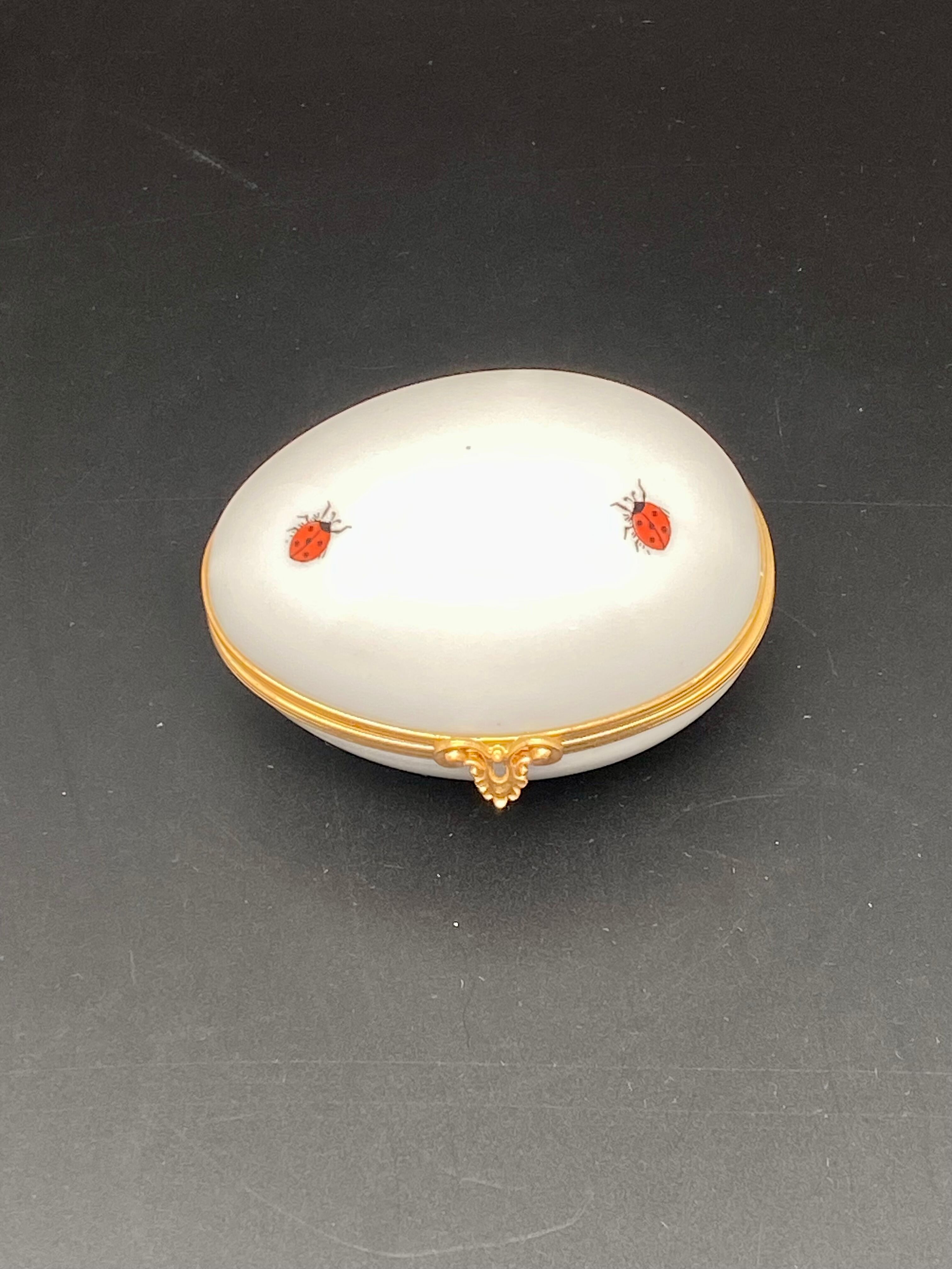 Decorative egg in Limoges porcelain Ladybug pattern