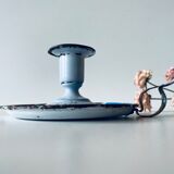 Old enamelled metal candlestick