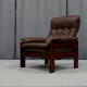 Pair of armchairs and ottoman in leather, 1970