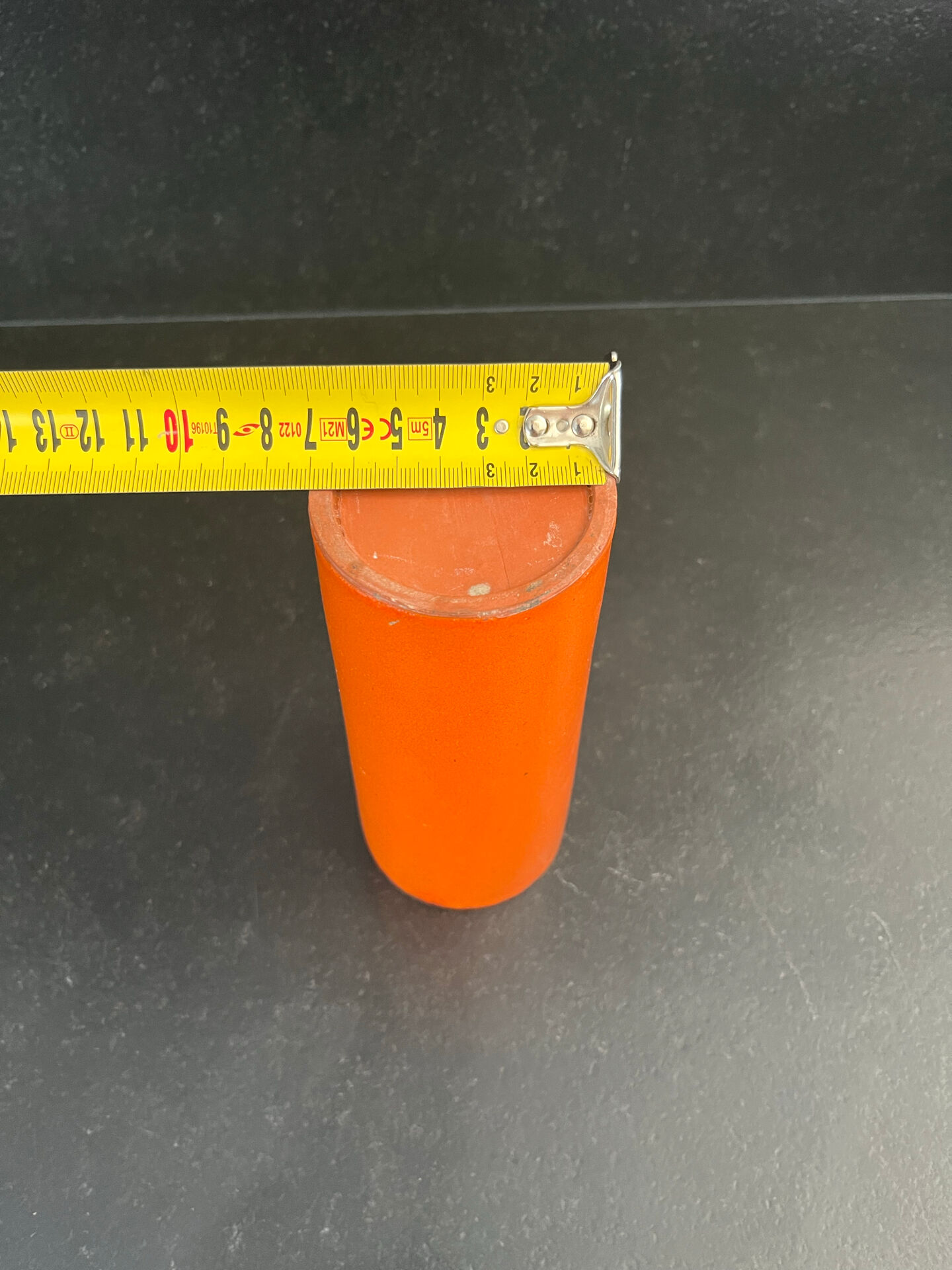 Orange glazed ceramic cylinder vase