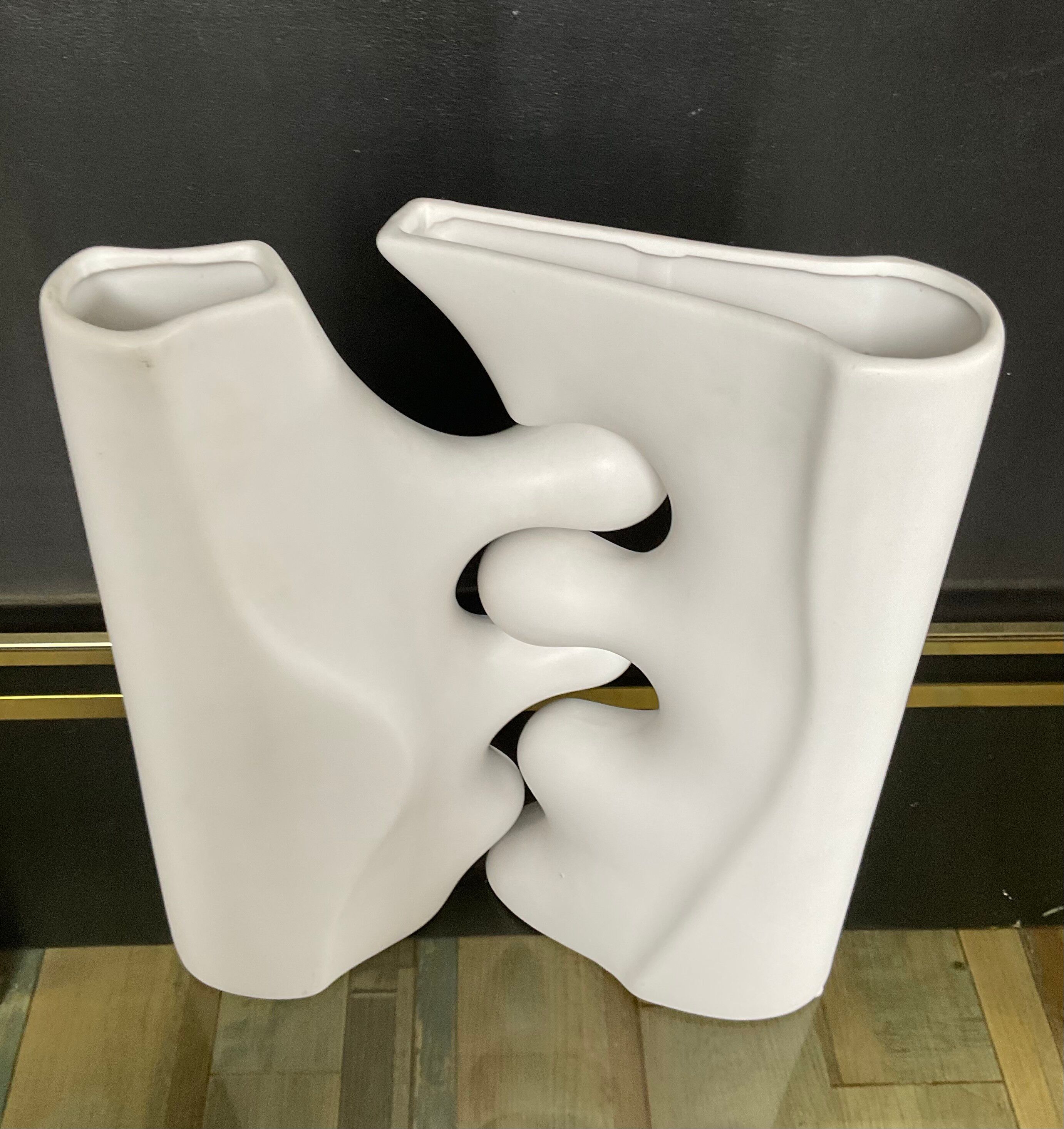 A pair of large designer ceramic vases.