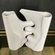 A pair of large designer ceramic vases.