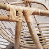 Antique swivel rattan armchair