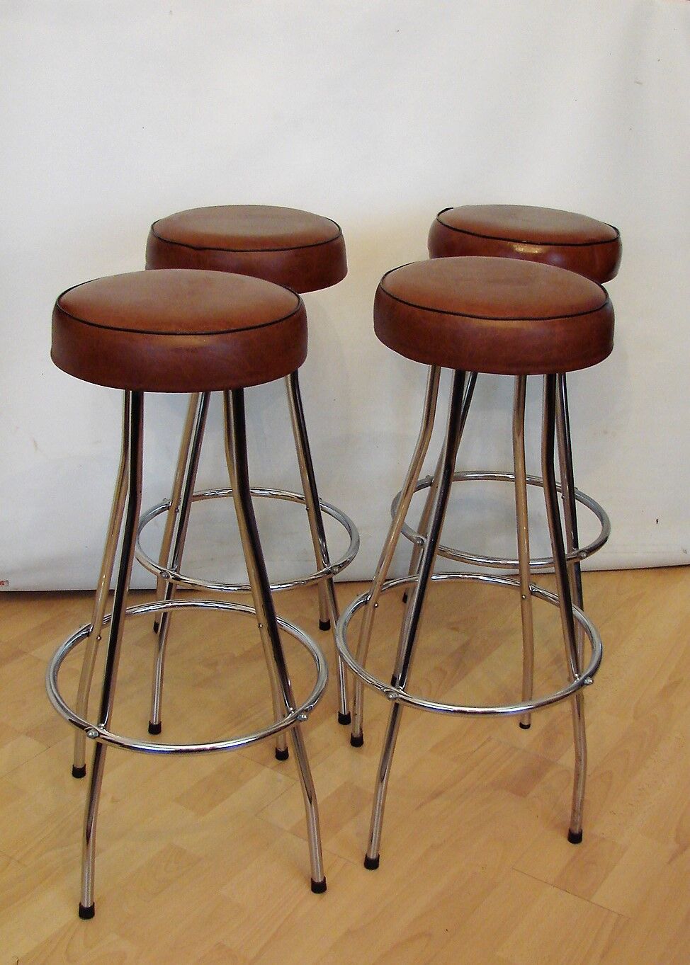 Pair of hockers, bar chairs 70s