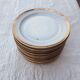 Set of golden Limoges plates