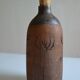 Bottle vase decorative flowers ceramic signature with fish to identify.
