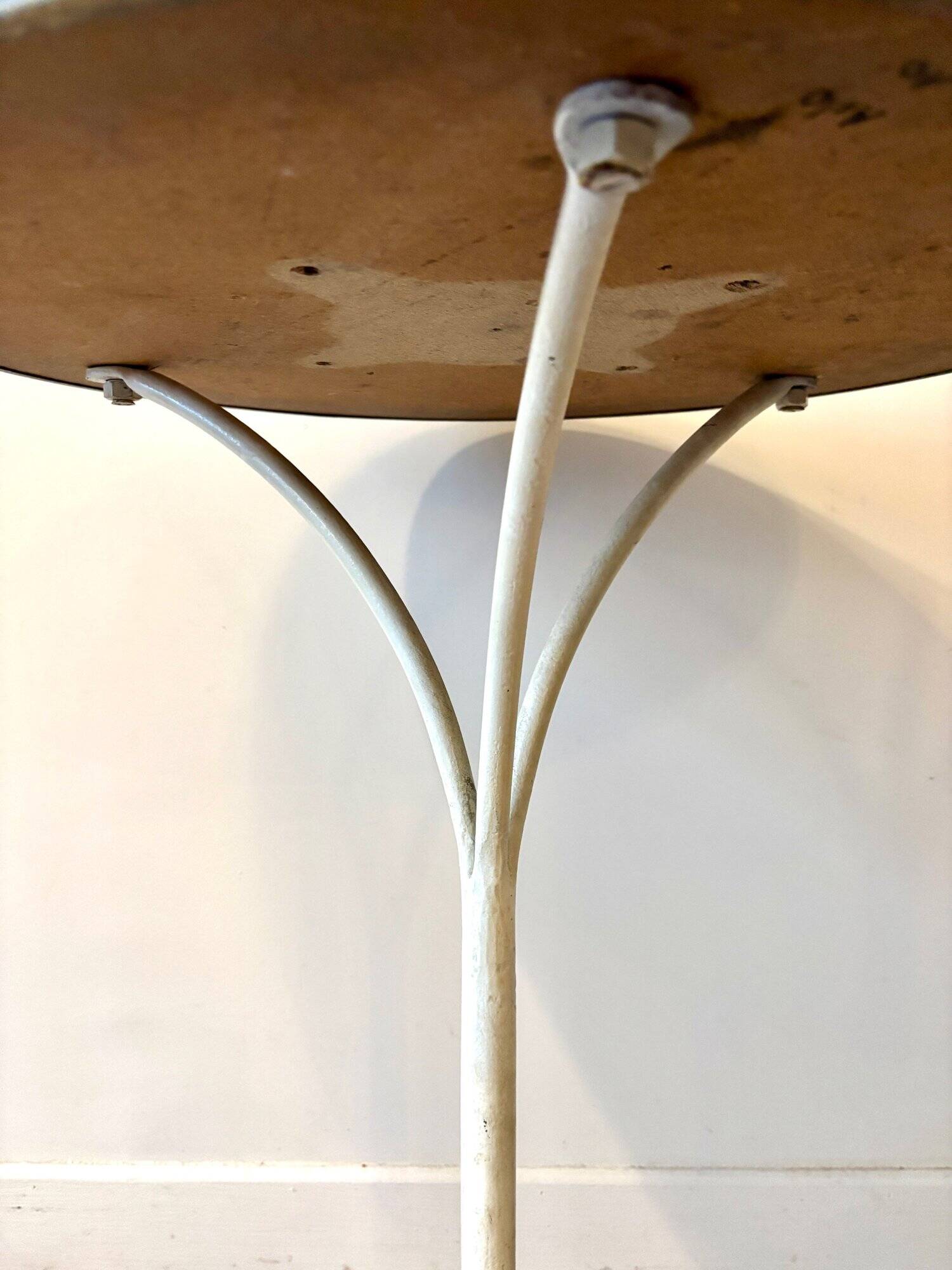 Bistro table in gray cast iron and brown melamine