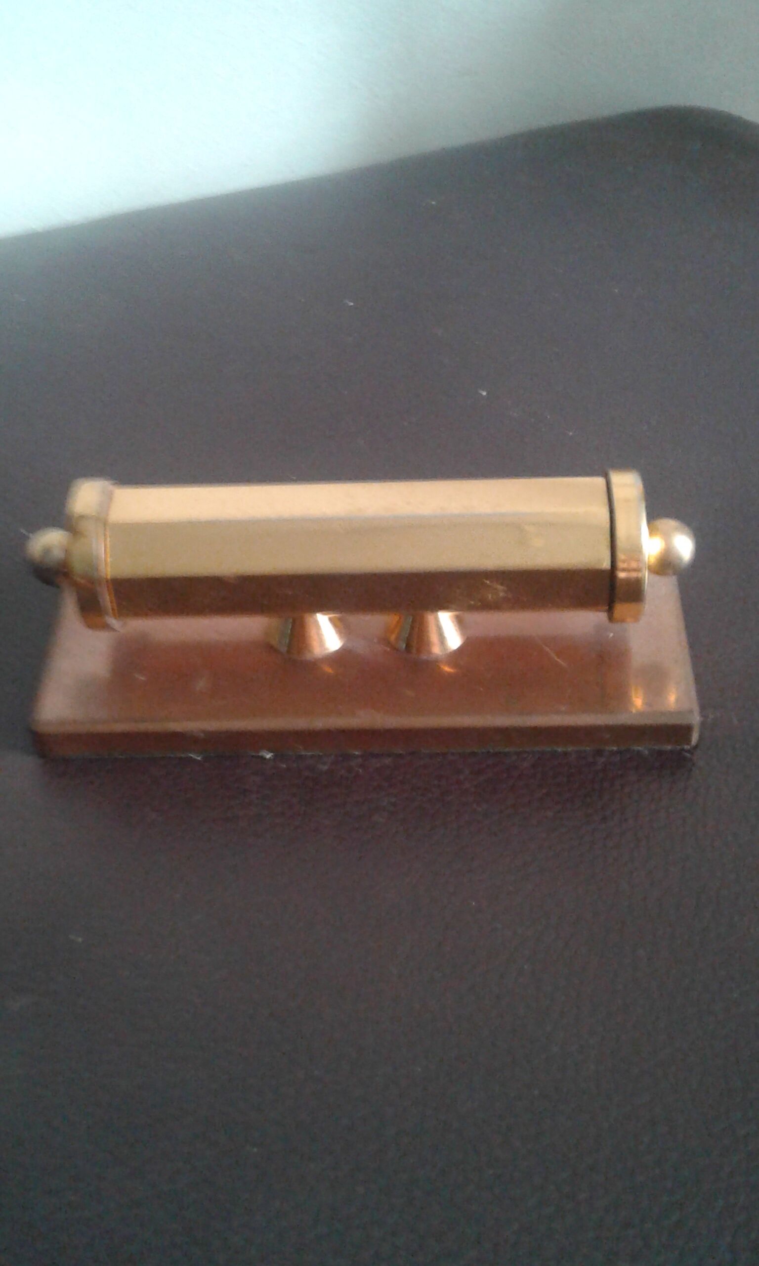 Ancient brass turnstile calendar