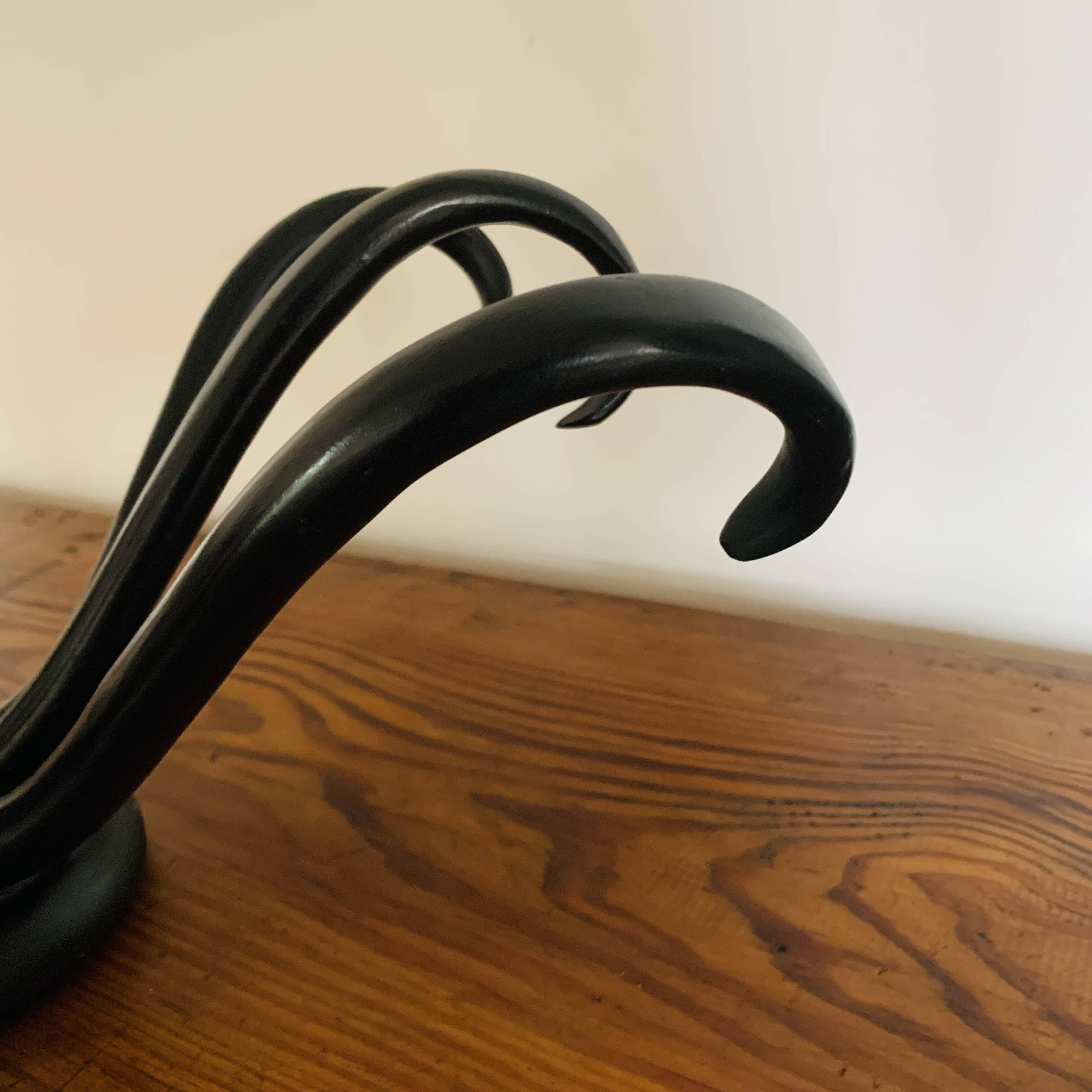 Wall-mounted coat rack with 3 hooks