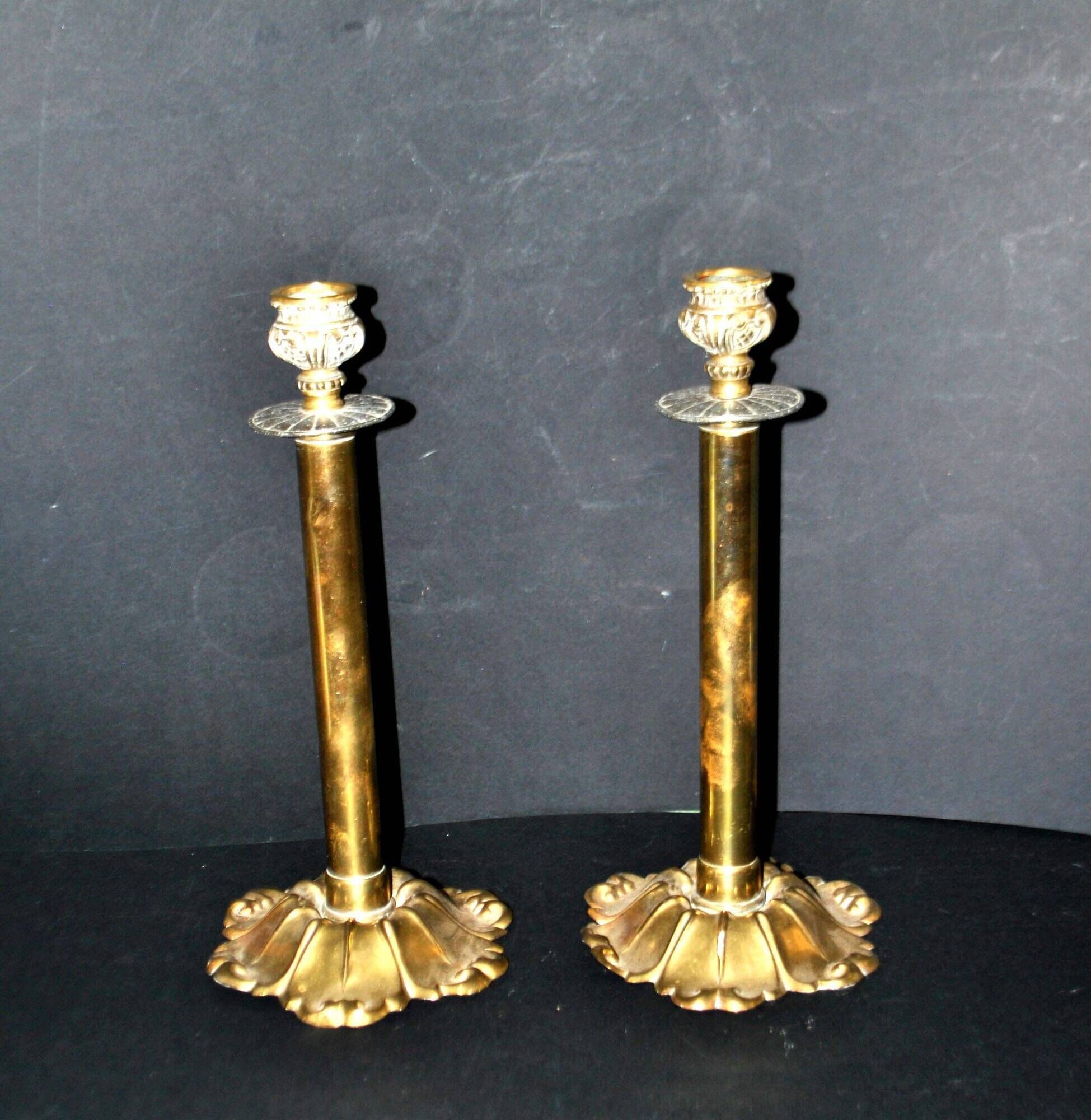 Lot of 2 antique brass and gilded bronze candle holders with acanthus decoration.