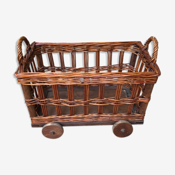 Small wicker wheeled cart