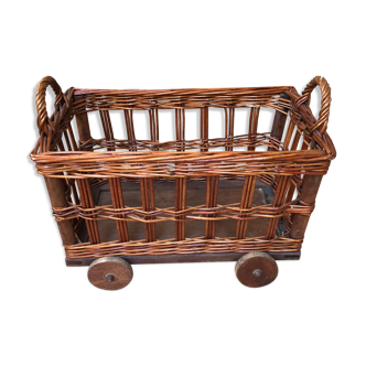 Small wicker wheeled cart