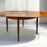 Extendable teak dining table