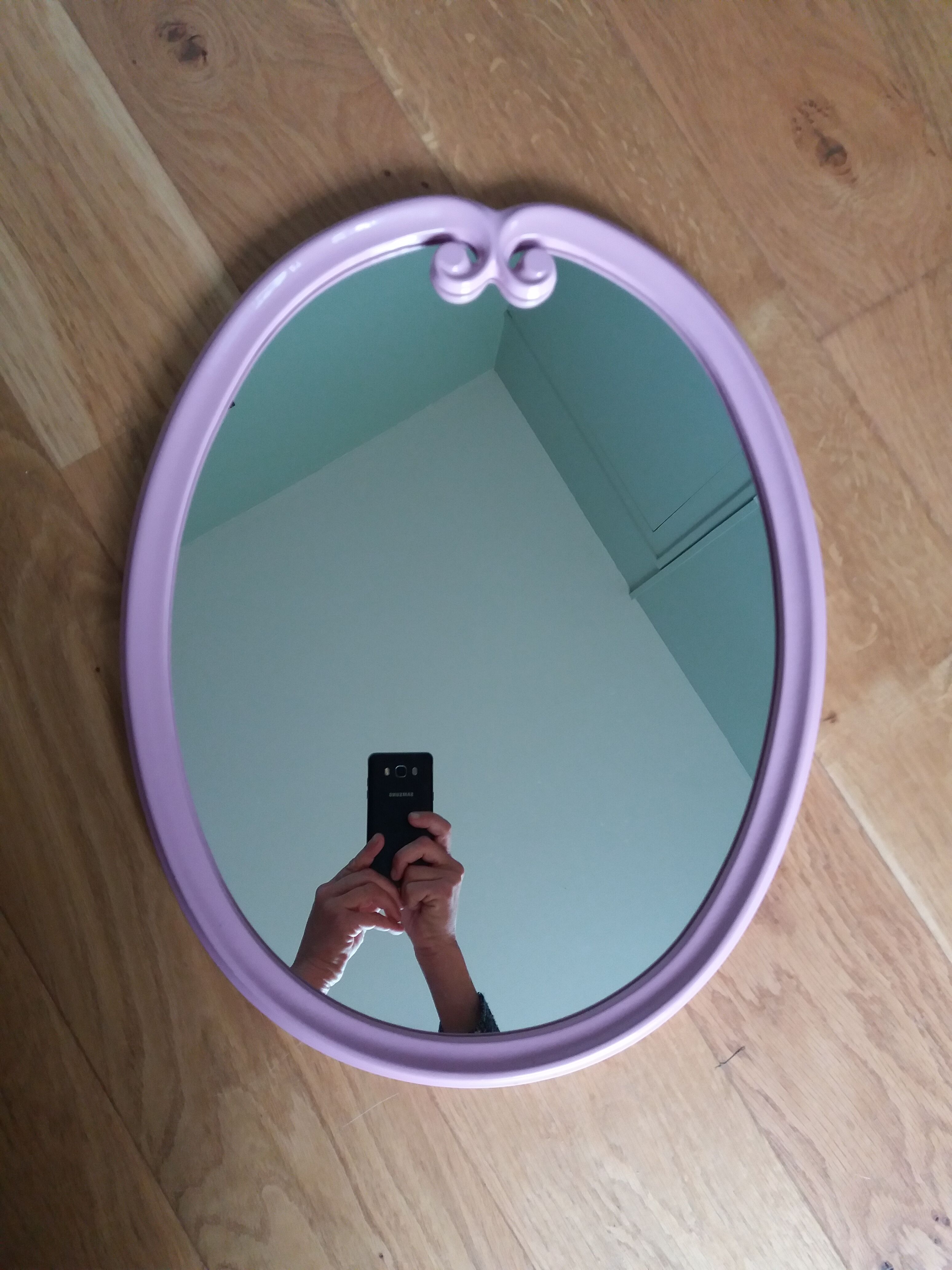 Oval mirror 49x39 frame in enamelled cast iron pink Art Deco