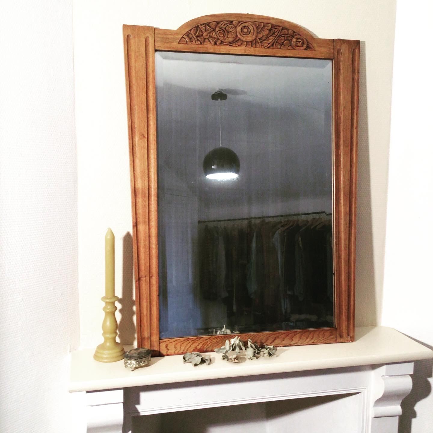 Beveled fireplace mirror