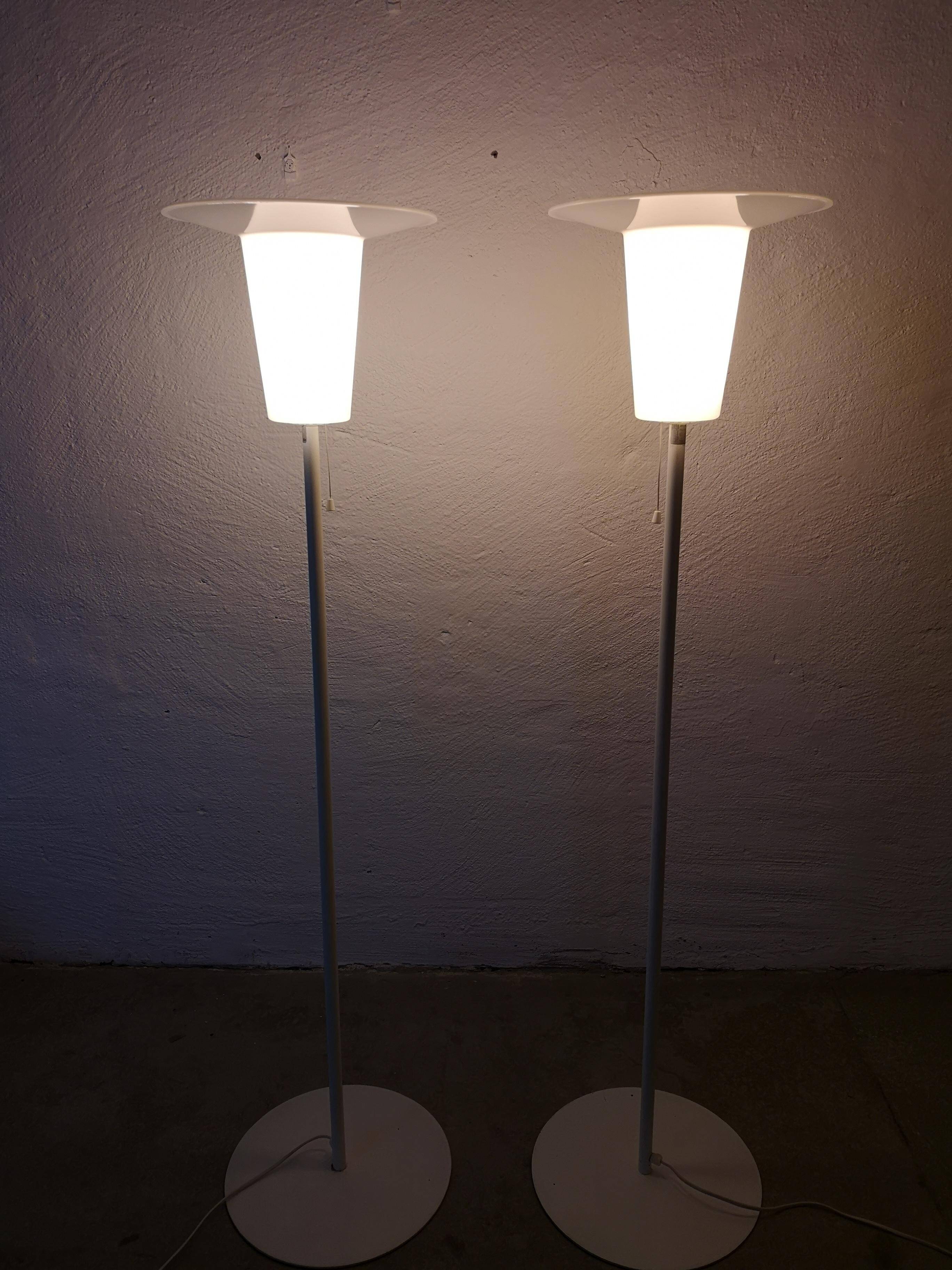 Pair of mid-century modern Luxus floor lamps, Sweden, 1970s.