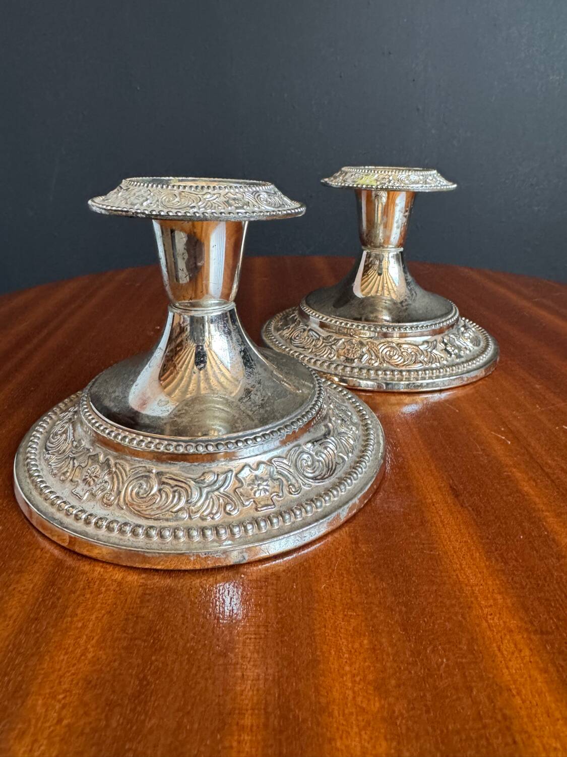Silver-plated metal candlesticks from the 1980s.