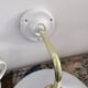 Set of two electrified white opaline wall lamps to nine