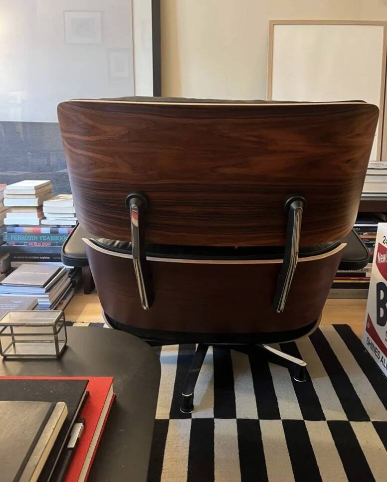Lounge chair and ottoman by Charles Eames