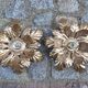 Paire d'appliques : fleurs dorées
