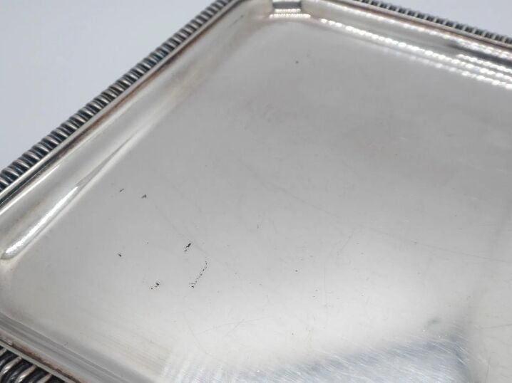 Small silver metal top