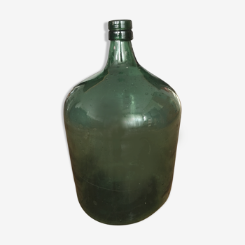 Old blown glass demijohn