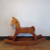 Cheval de bois ancien à bascule