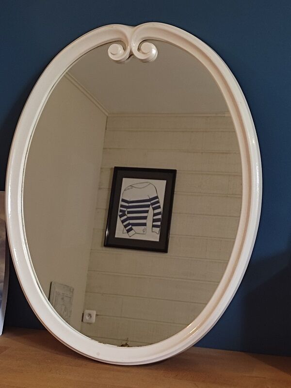 Oval mirror patinated white enamelled metal frame