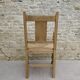Fauteuil néo basque en bois clair et assise cannée