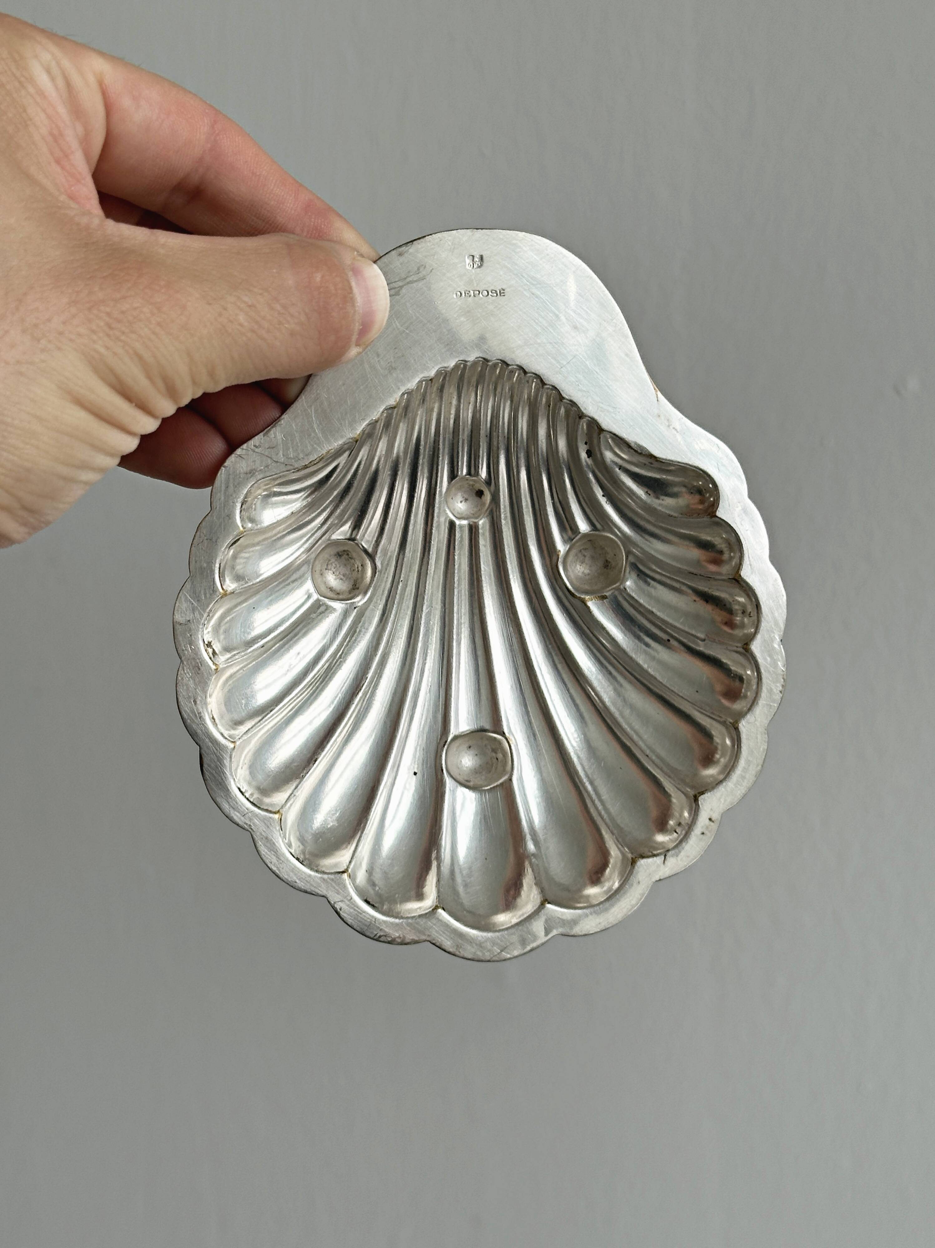 Pair of silver shell bowls