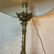 Lampe pique cierge bronze tripodes décor aigle
