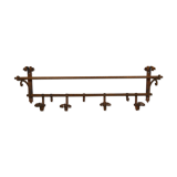 Coats in wrought iron door