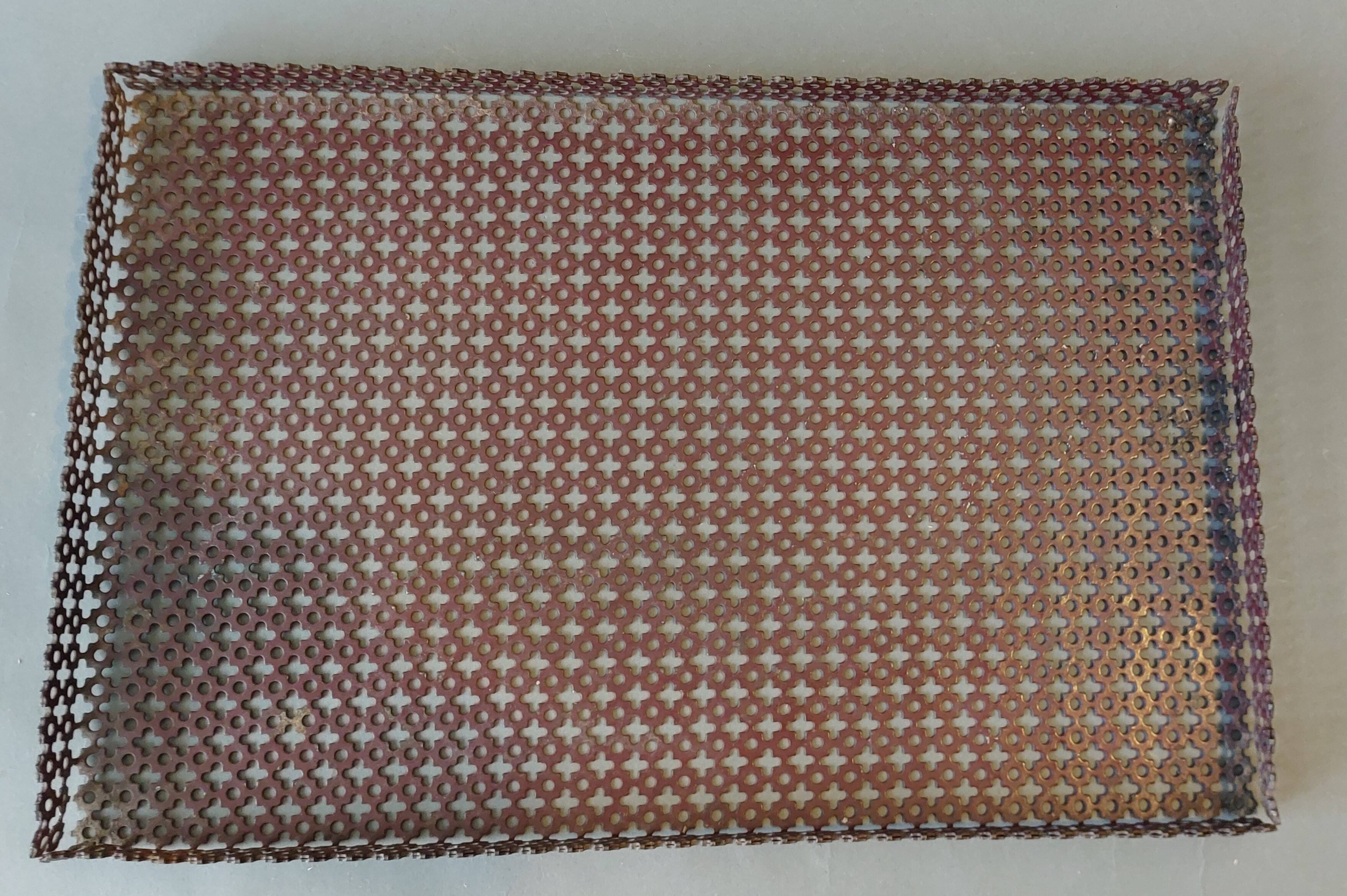 Especially table tray in perforated metal 1950.