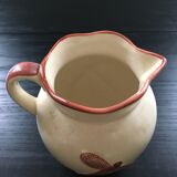 Pitcher with dragonfly decor