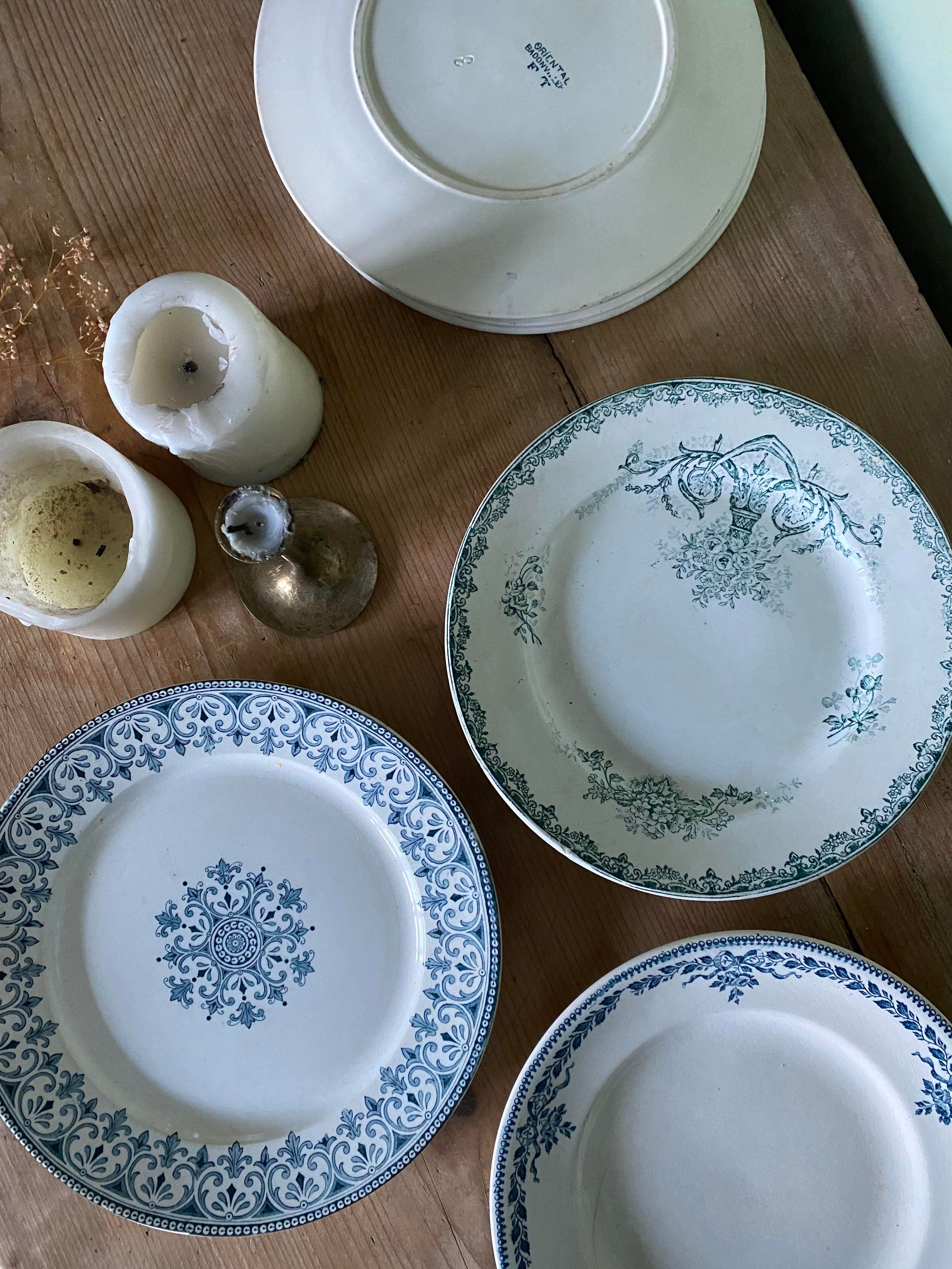 Set of 6 old flat plates in mismatched iron earth