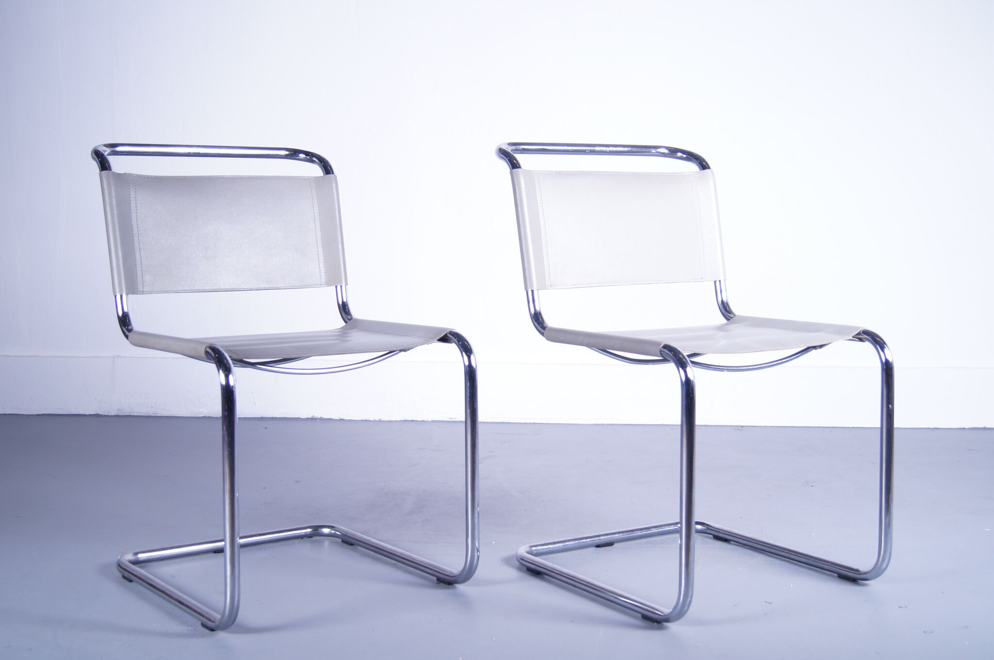 Set of 2  italian grey leather cantilever seats