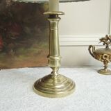 Brass candlestick lamp with its fabric lampshade by William Morris