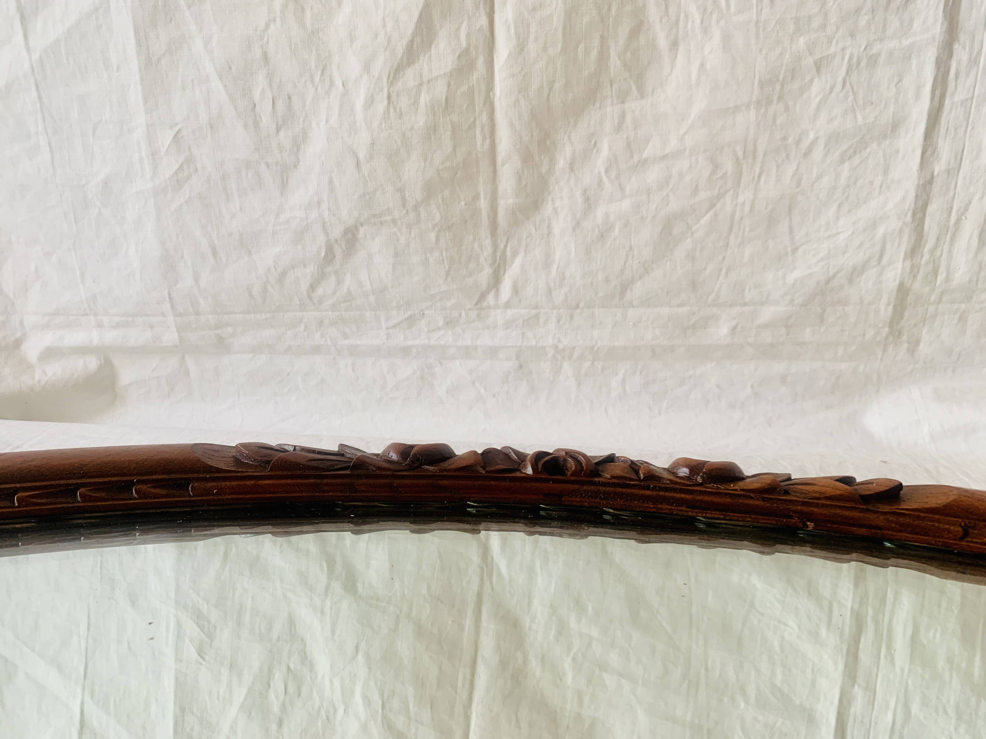 Large Art Deco oval mirror in carved wood - 87 x 53 cm