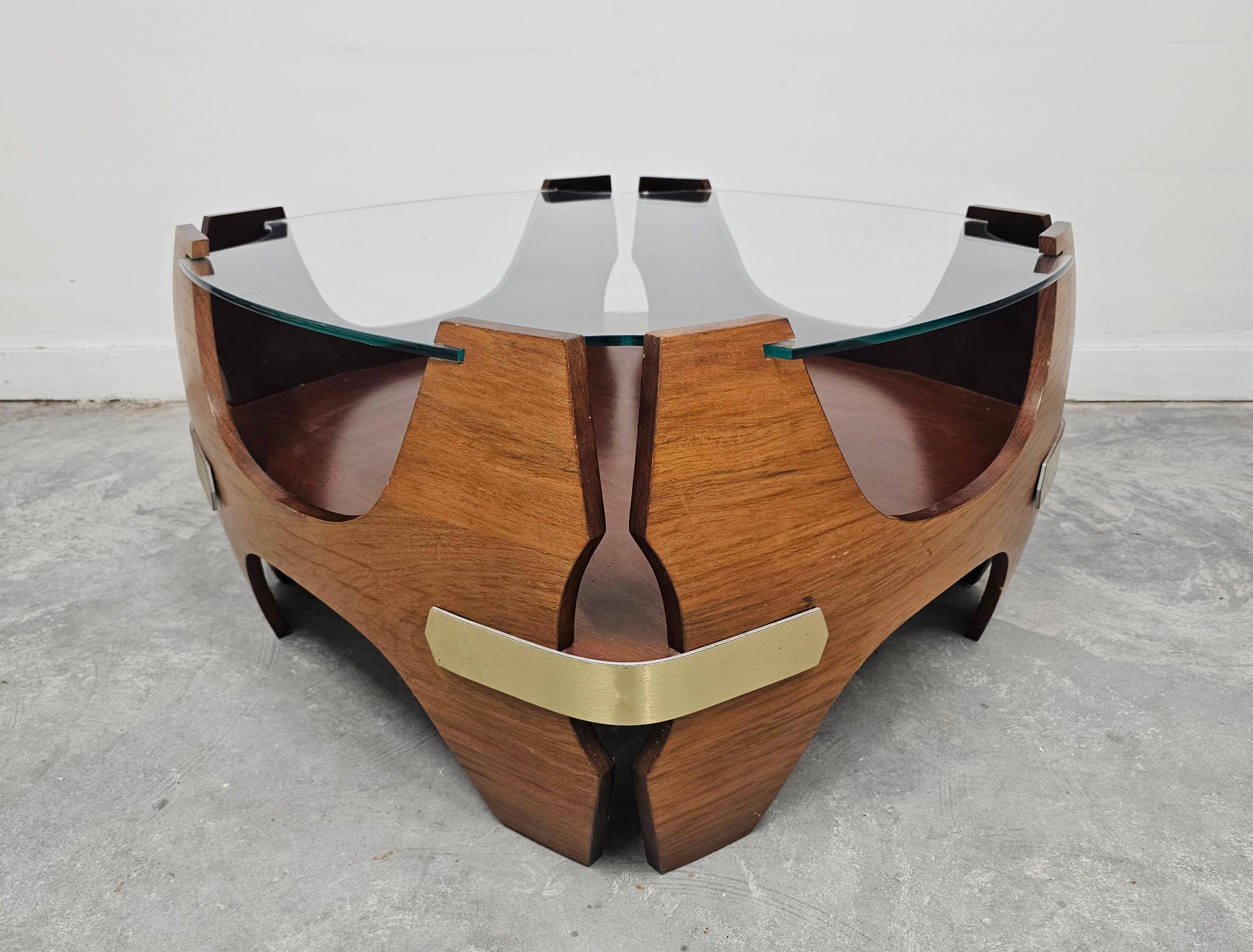 Mid-century coffee table in curved plywood with a glass top, 1940s.