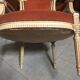 Patinated armchair in Louis XVI style